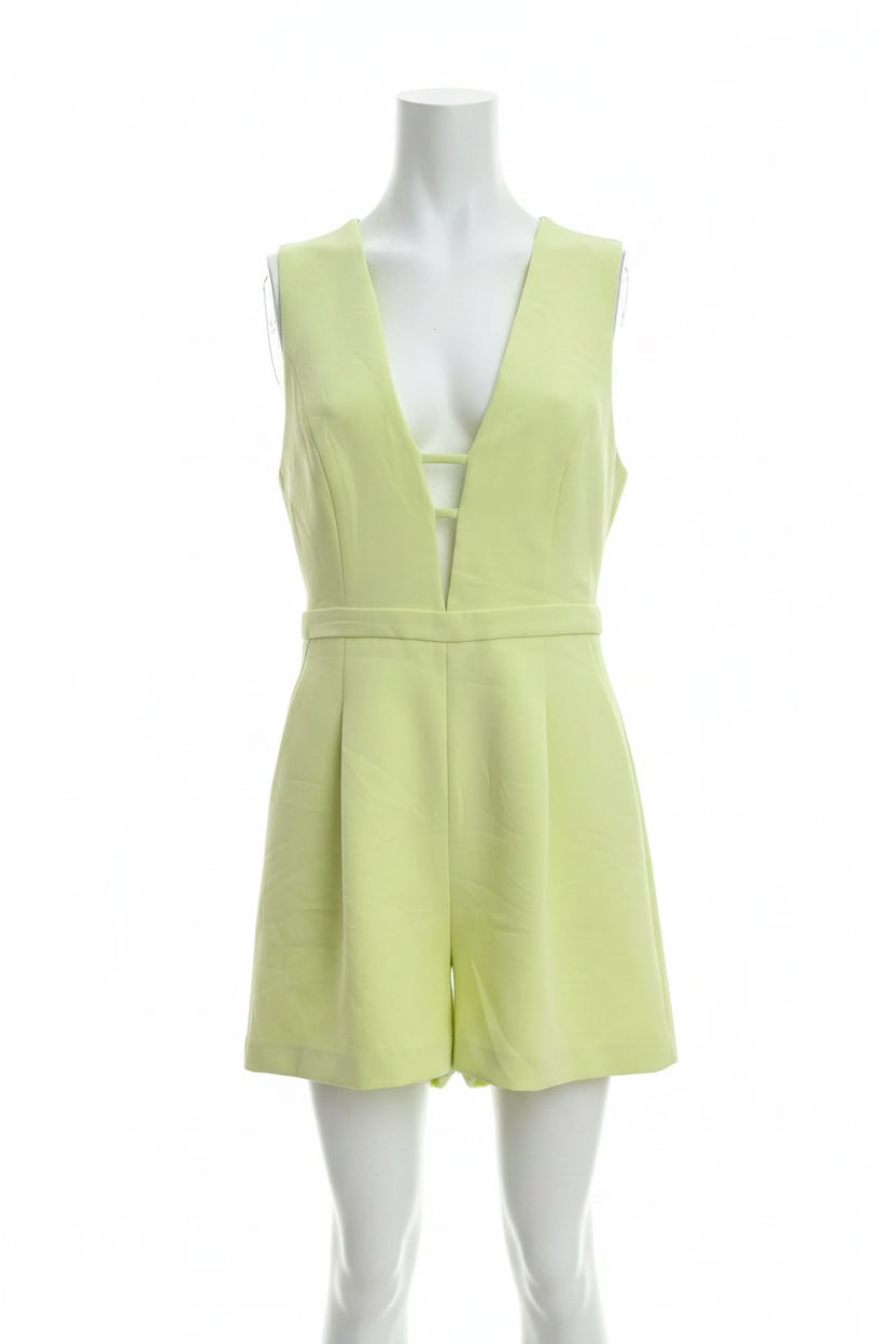 BCBGMAXAZRIA chartreuse romper, angled front view showing plunge neckline