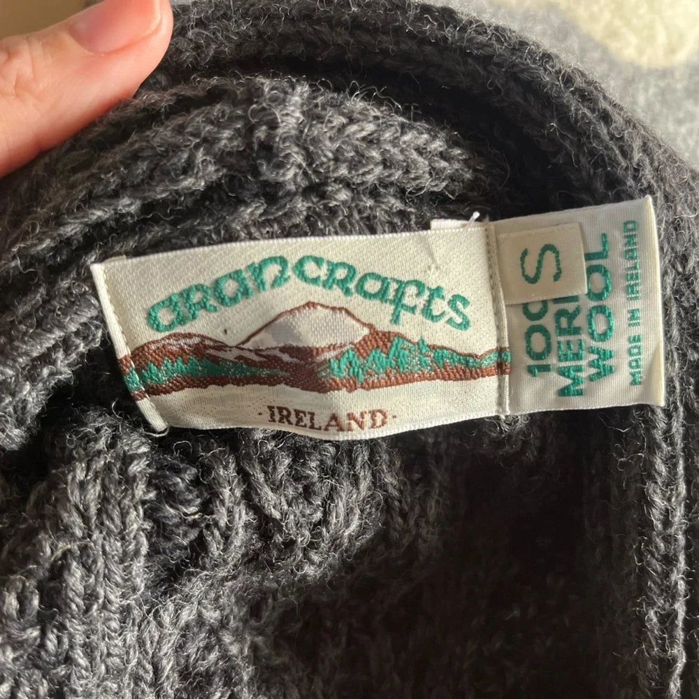 Aran Crafts Ireland label showing 100% merino wool, size S, made in Ireland