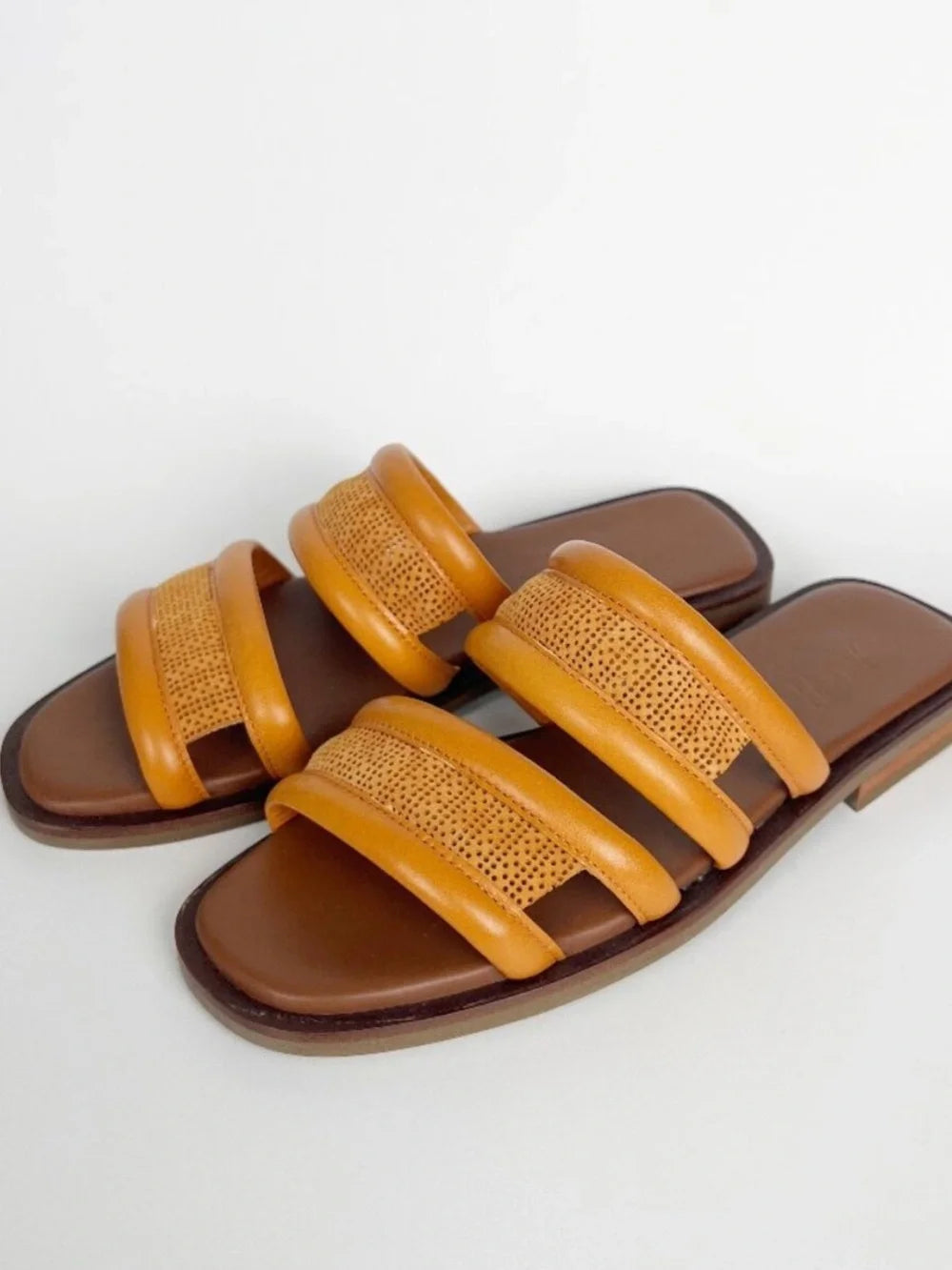 John Rmor leather raffia slide sandals, top view pair